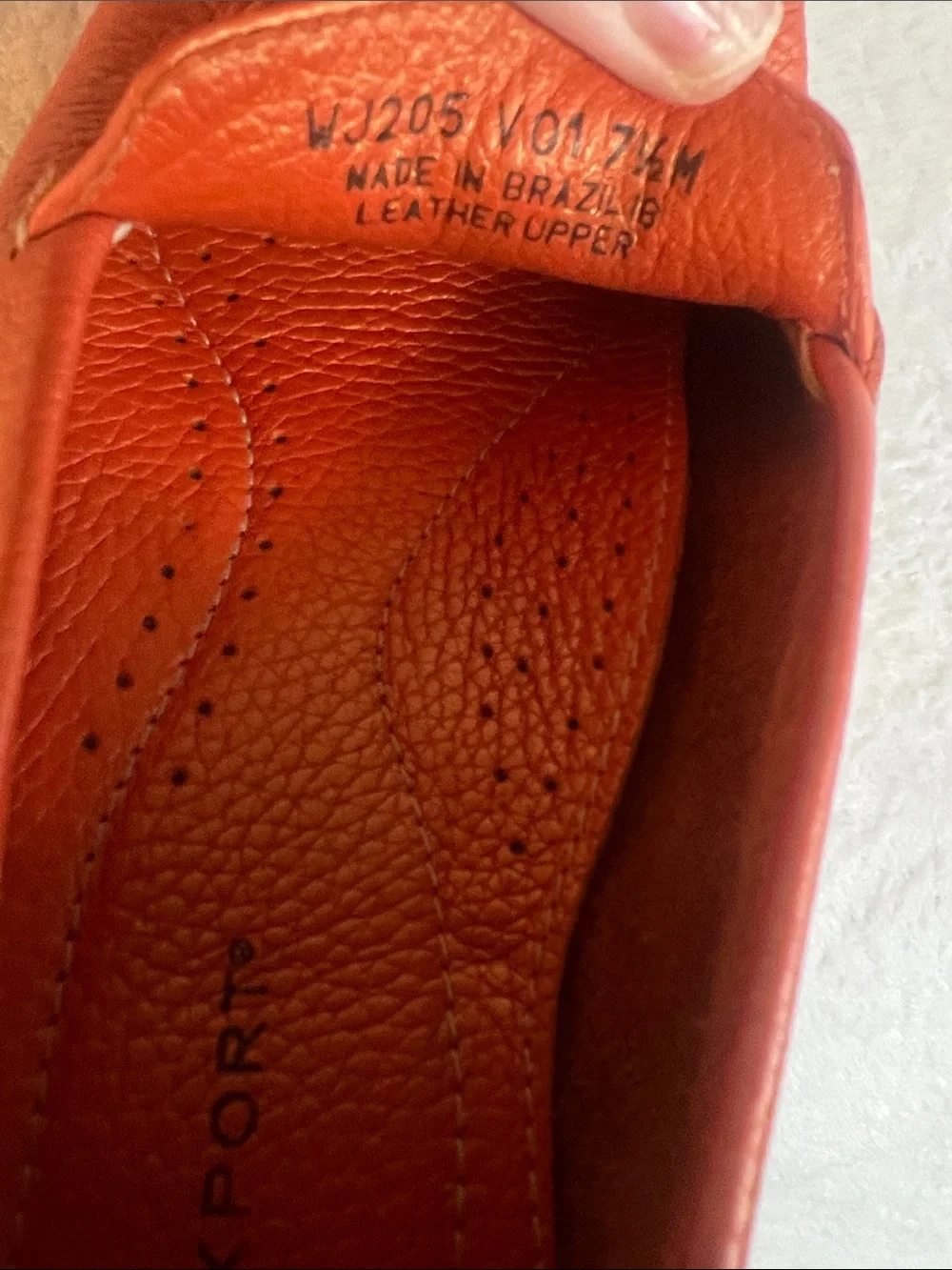 Rockport women’s orange pebbled leather square toe penny loafers